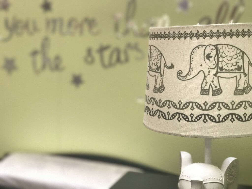 lamp with an elephant print in child's room