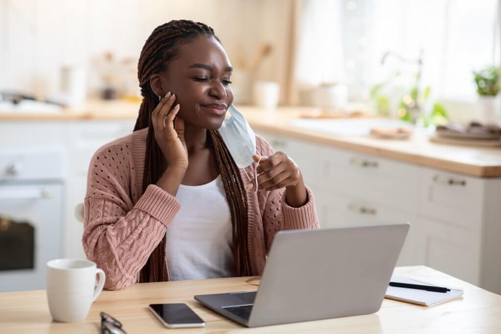 young woman itching her head