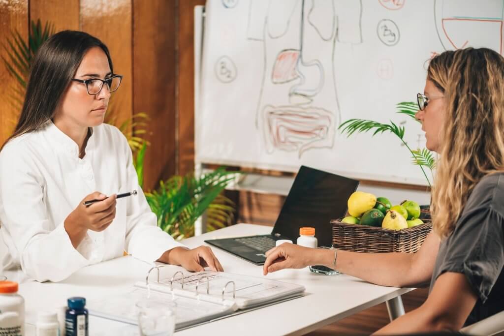 a doctor talking with a patient about nutrition