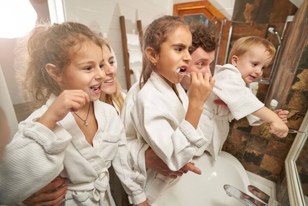 Portrait of young parents and children having fun